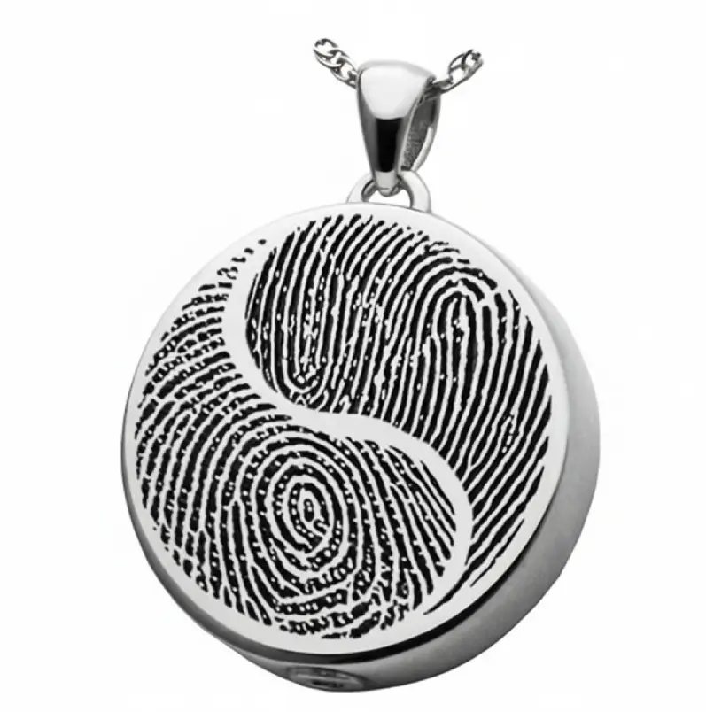 Médaille avec une empreinte digitale gravée au laser